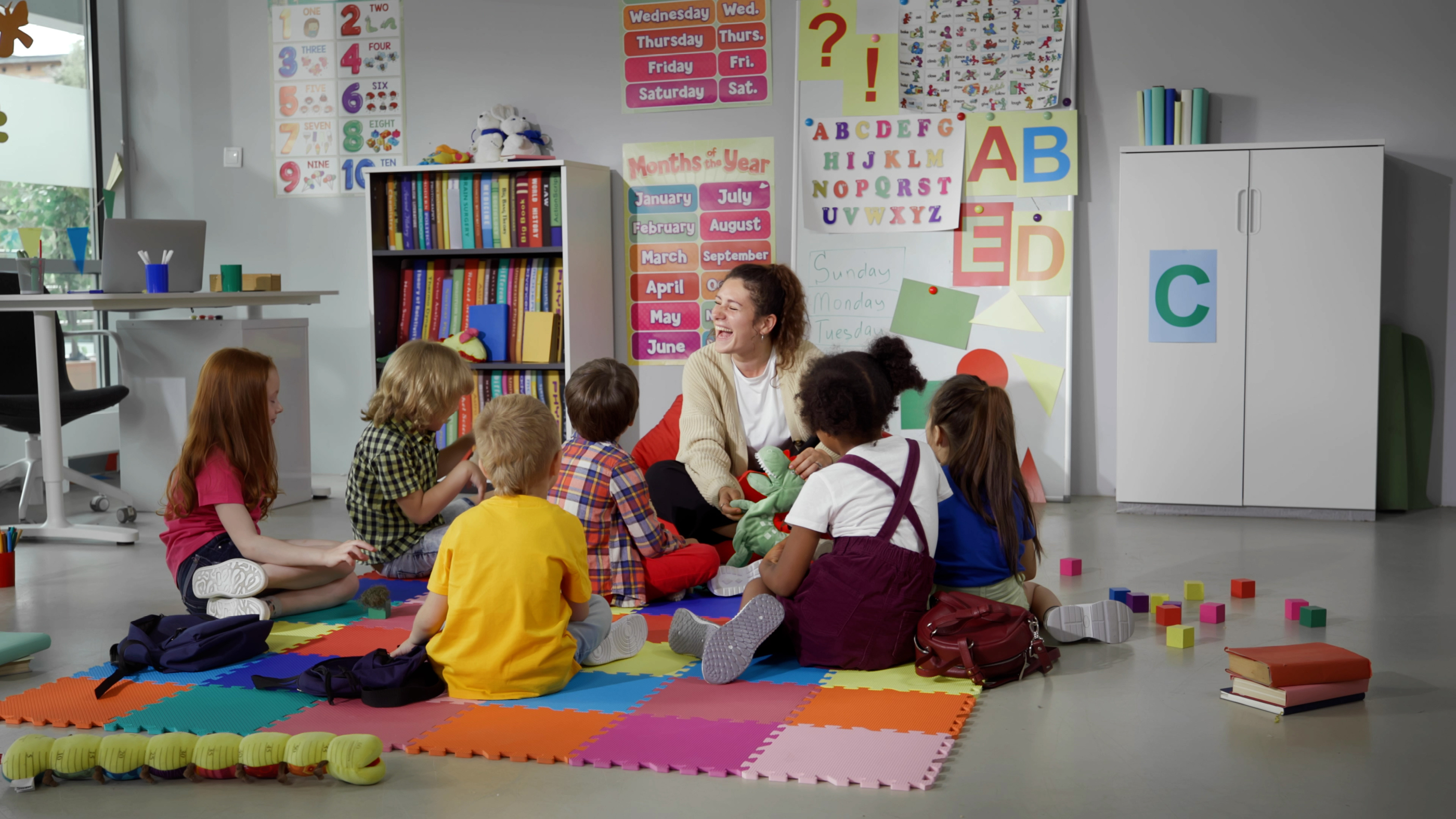 Early learning and childcare GA reading to nursery students