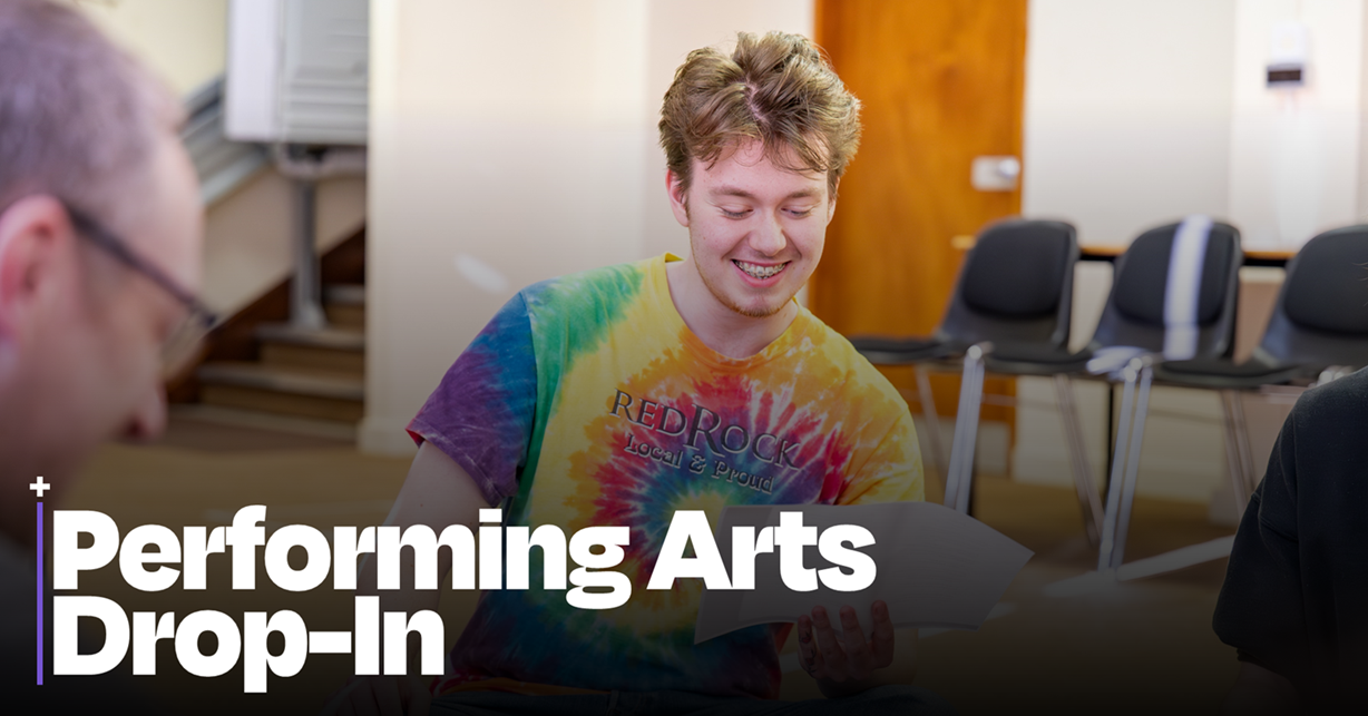 Photo of male acting student in a bright tie dye t-shirt reading a script. One top is the words Performing Arts Drop In Photo of male acting student in a bright tie dye t-shirt reading a script. One top is the words Performing Arts Drop In