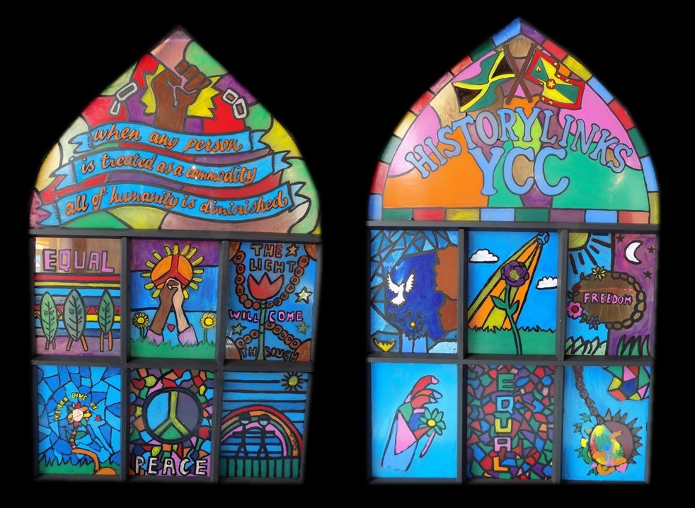 Two artworks in stained glass style, celebrating equality, peace and freedom. Colourful windows are set against a black background Two artworks in stained glass style, celebrating equality, peace and freedom. Colourful windows are set against a black background