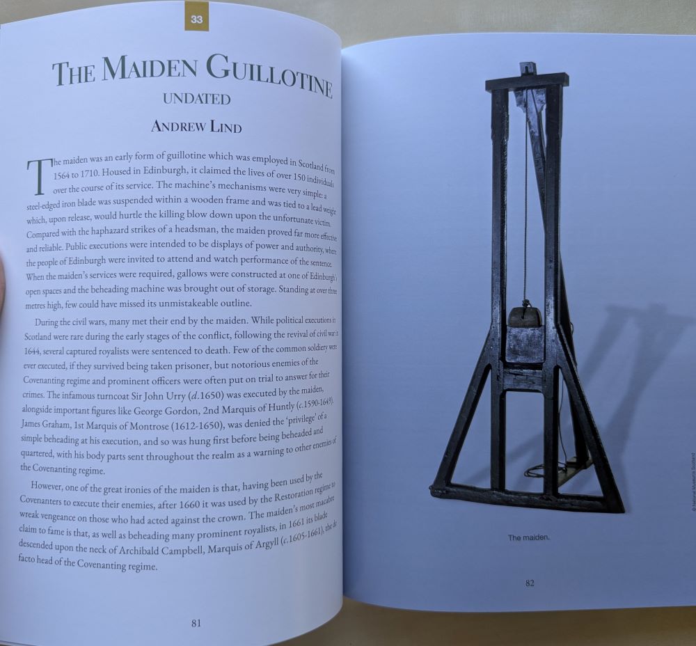 A photograph of the page of a book entitled the Maiden Guillotine A photograph of the page of a book entitled the Maiden Guillotine