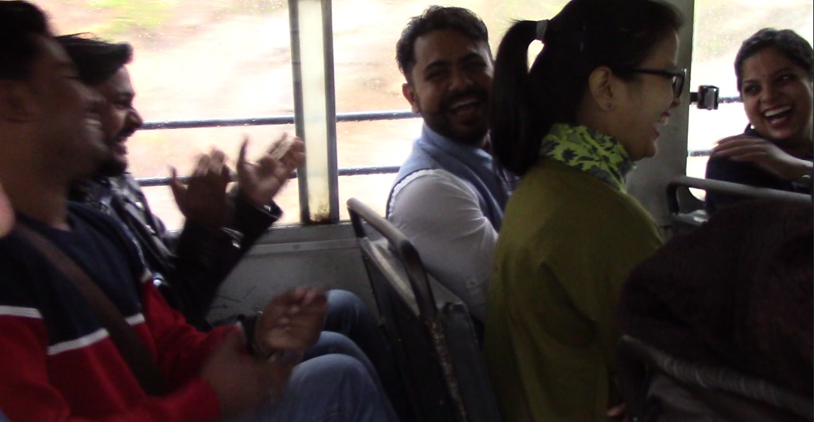Students laughing on a bus Students laughing on a bus