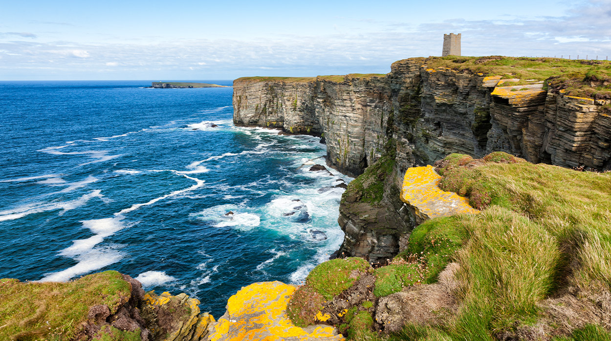 Dramatic cliffs off the coast of Orkney Dramatic cliffs off the coast of Orkney