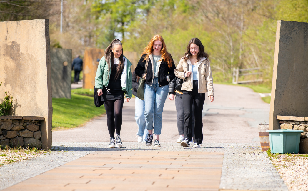 Students walking outside a campus Students walking outside a campus