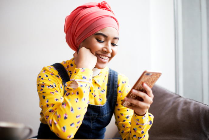 Woman looking at her phone Woman looking at her phone