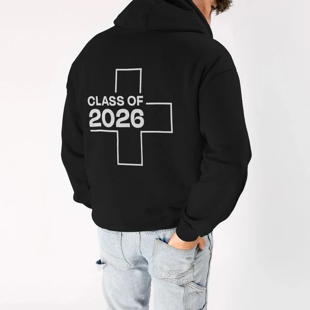 A person standing with their back to the camera and the UHI hoodie says 'Class of 2026